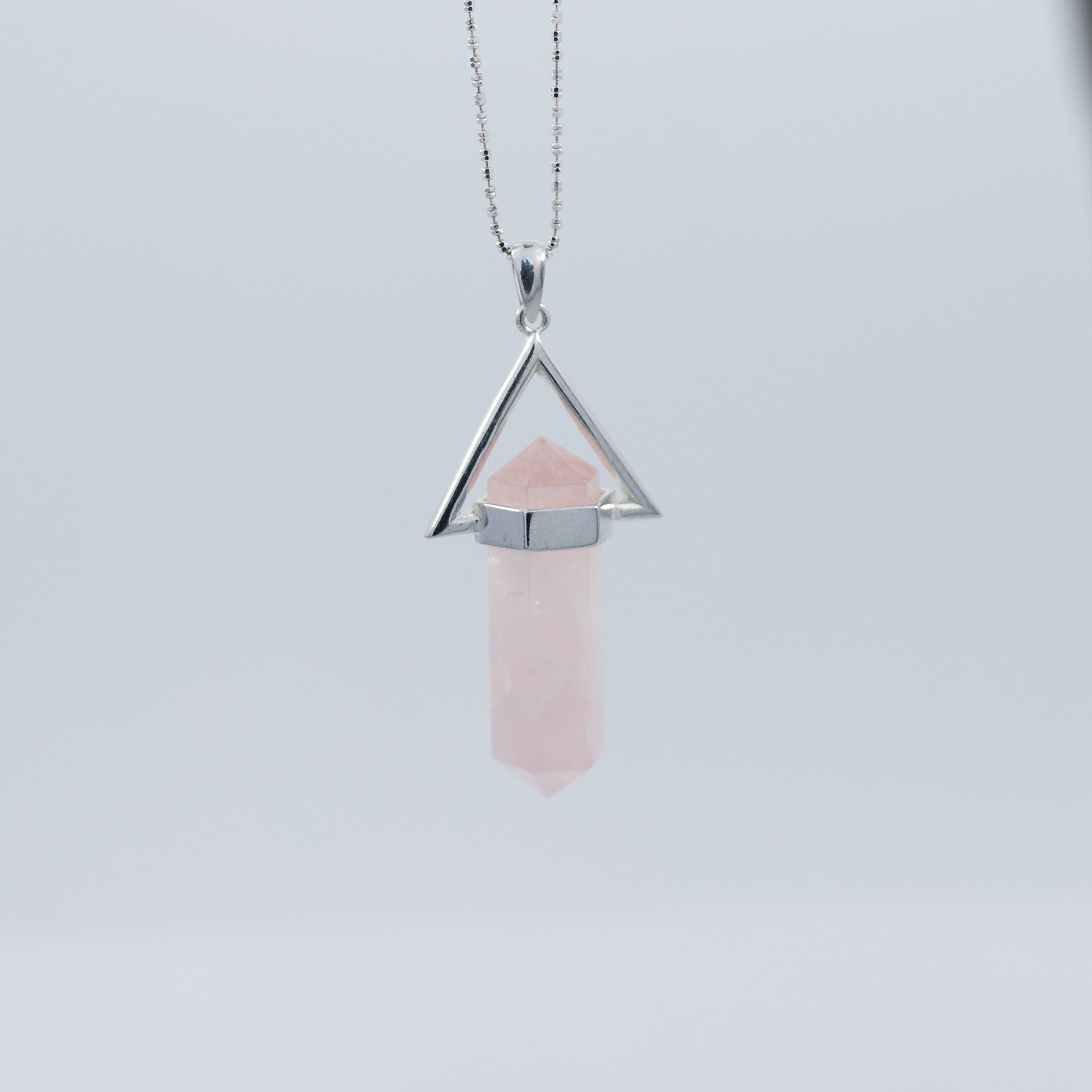 Quartz and pyramid pendant