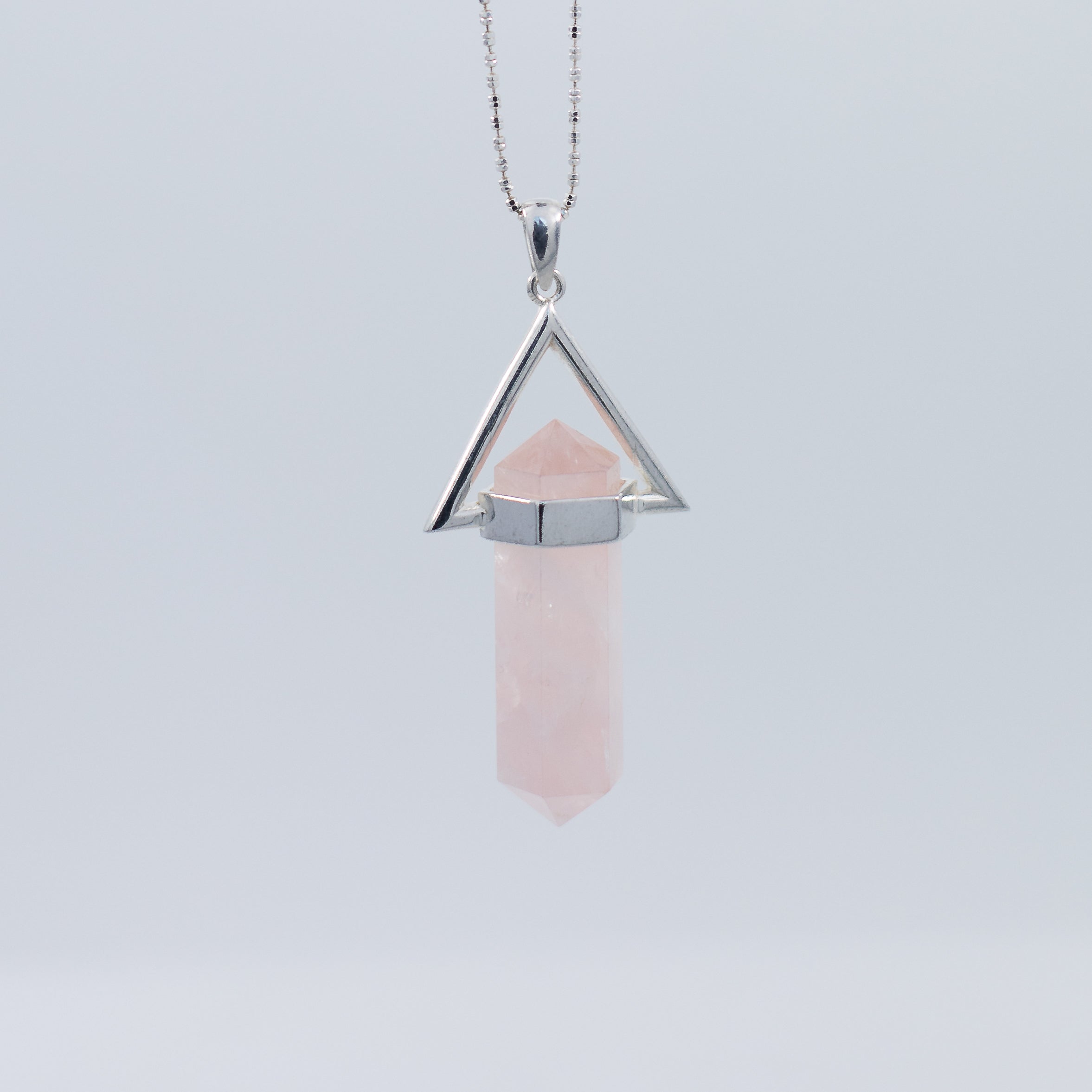 Quartz and pyramid pendant