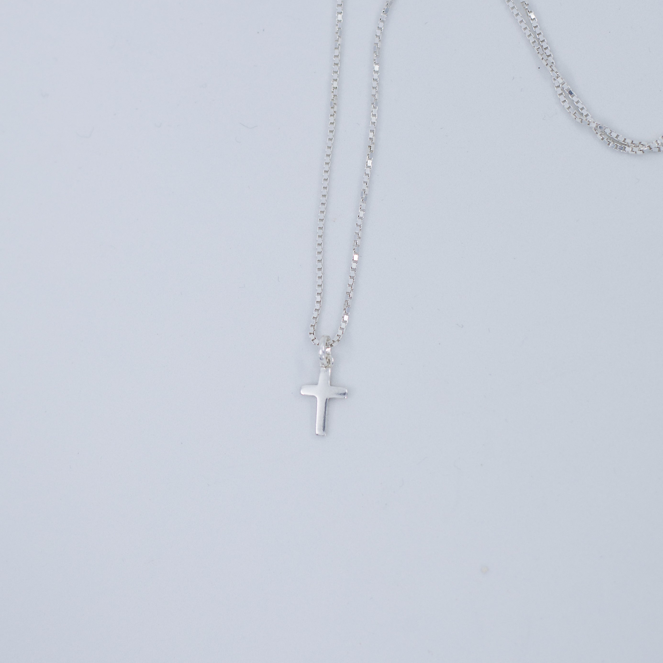 Small cross pendant