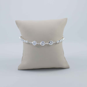 Beaded and heart shaped zirconia silver bracelet