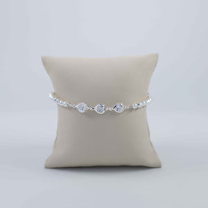 Beaded and heart shaped zirconia silver bracelet