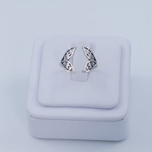 Twin whale tail ring