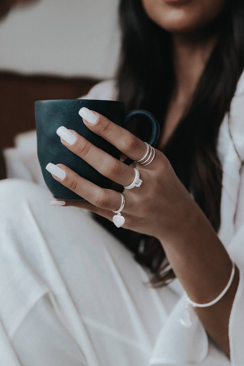 Dangling heart silver ring