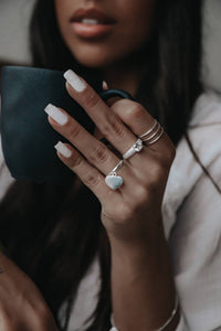 Dangling heart silver ring